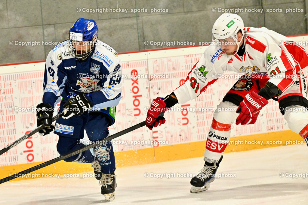 ESV FERLACH vs. ESC SOCCERZONE STEINDORF | #69 Kreuzer Philipp ESC Steindorf, #91 Alagic Adis ESV Ferlach, ESV FERLACH vs. ESC SOCCERZONE STEINDORF, ESV FERLACH vs. ESC SOCCERZONE STEINDORF am 22.11.2024 in Ferlach (Eishalle Ferlach ), Austria, (Photo by Bernd Stefan)