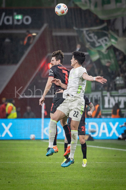 German Bundesliga, Bayer 04 Leverkusen vs. SV Werder Bremen, 24.01.2026 | LEVERKUSEN, GERMANY - JANUARY 24: Jonas Hofmann (Bayer 04 Leverkusen, 7) and Julian Malatini (SV Werder Bremen, 22) during the German Bundesliga match on gameday 19 between Bayer 04 Leverkusen vs. SV Werder Bremen at BayArena on January 24, 2026 in Leverkusen, Germany. DFL REGULATIONS PROHIBIT ANY USE OF PHOTOGRAPHS AS IMAGE SEQUENCES AND/OR QUASI-VIDEO.