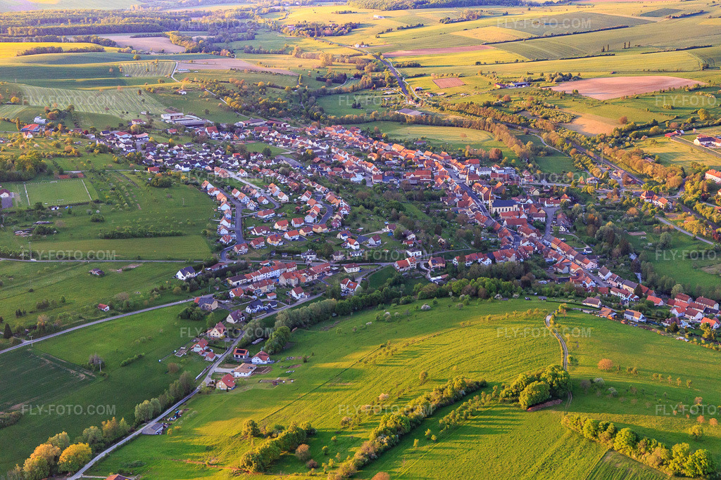 Aerial view: Overview of locations from the south in Oermingen in the state Bas-Rhin, France.Photo: IMG_145886.jpg taken on 04/30/2025 by Werner Riehm/FLY-FOTO.comResolution of the original: 5472 x 3648 px