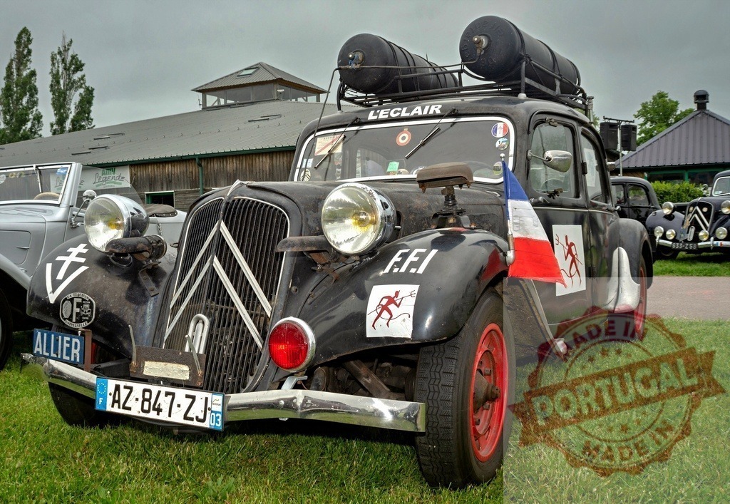 Citroën Traction Avant car on display with FFI markings | Vintage French Resistance car, a Citroën Traction Avant, presented with World War II gazogene equipment - Realized with Pictrs.com