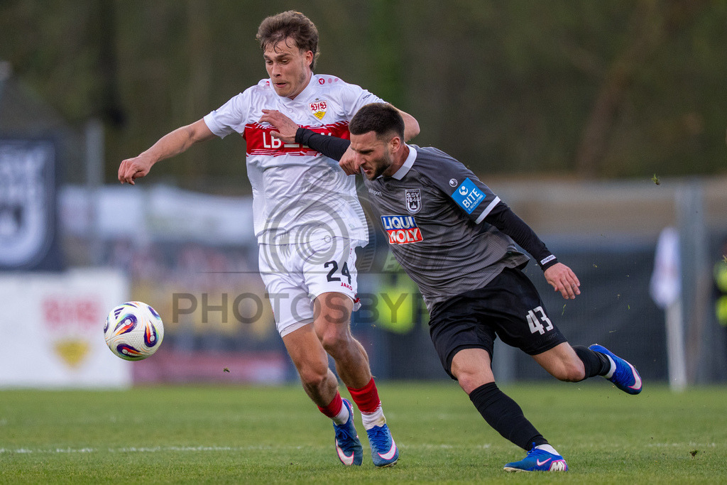 VfB Stuttgart II vs. SSV Ulm 1846 Fussball, Fussball, 3. Liga, 32. Spieltag, 08.04.2026 | Zweikampf zwischen Christopher Olivier (VfB Stuttgart II, #24) und Leon Dajaku (SSV Ulm 1846 Fussball, #43),VfB Stuttgart II vs. SSV Ulm 1846 Fussball, Fussball, 3. Liga, 32. Spieltag, 08.04.2026DFB regulations prohibit any use of photographs as image sequences and/or quasi-video