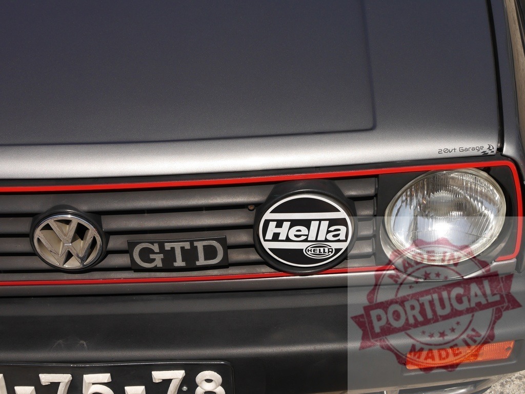 Volkswagen Golf GTD vintage car front grille | Volkswagen Golf GTD vintage car showing grille, headlight, and Hella auxiliary lamp - Realisiert mit Pictrs.com