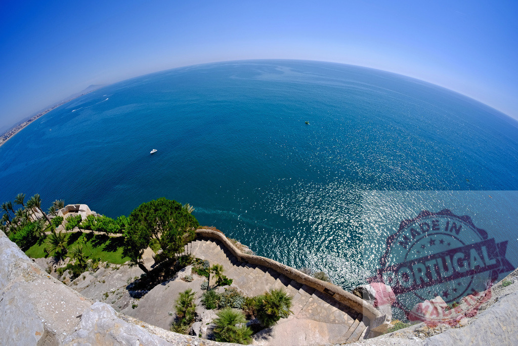 Breathtaking fisheye view of endless blue sea from Santa Barbara Castle in Alicante | Scenic fisheye perspective overlooking the vast Mediterranean Sea from Santa Barbara Castle, Alicante, Spain, featuring vibrant blue waters under a clear sky - Realisiert mit Pictrs.com