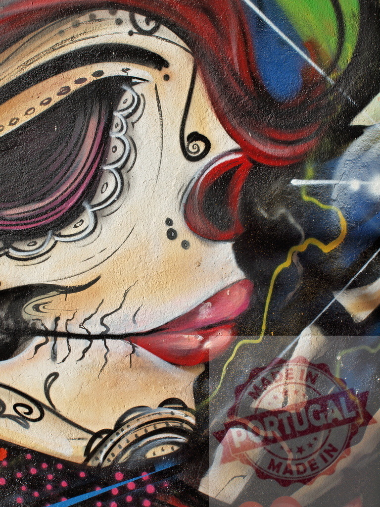 Catrina wearing makeup and showing red lips in urban graffiti art | Catrina with red lips and makeup, depicted in a colorful urban graffiti artwork - Realized with Pictrs.com