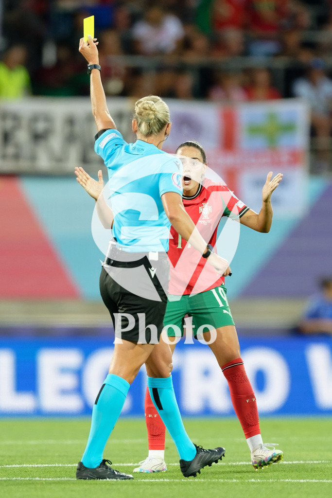 Portugal v Belgium: UEFA Women's EURO 2025 Group B | SION, SWITZERLAND - JULY 11: Tess Olofsson, referre,  gives a yellow card to Diana Gomes of Portugal  during the UEFA Women's EURO 2025 Group B match between Portugal and Belgium at Stade de Tourbillon on July 11, 2025 in Sion, Switzerland. (Photo by Giuseppe Velletri/Sports Press Photo/Getty Images)