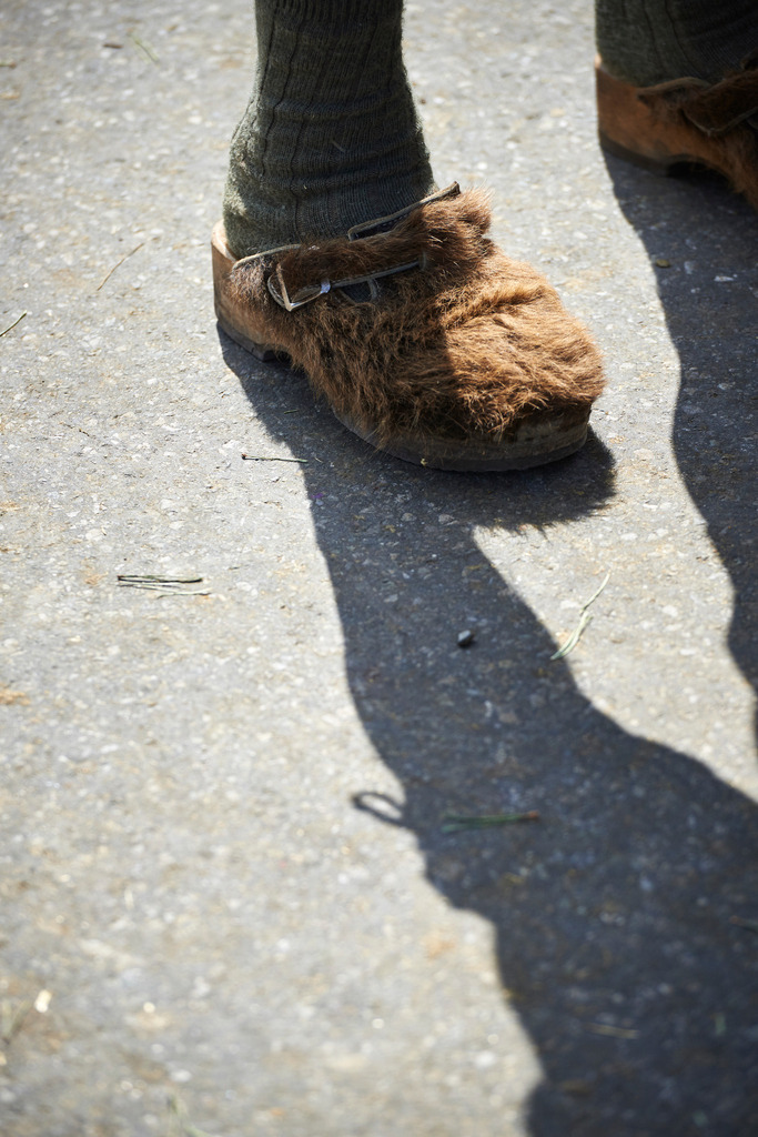 Alptag in Schwarzenberg | Schwarzenberg, Austria - September 08, 2015: Alptag in Schwarzenberg, Holzschuhe mit Kuhfell. - Realisiert mit Pictrs.com
