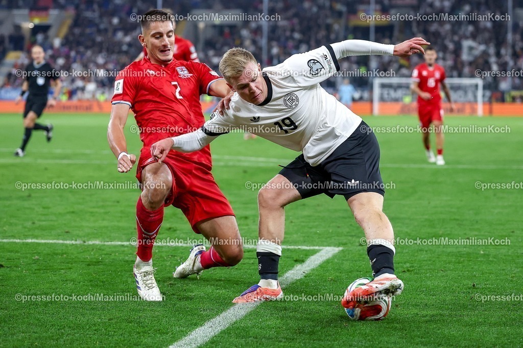 DFB10102501131 | 10.10.2025, Fußball, Länderspiel, Deutschland - Luxemburg, UEFA WM-Qualifikation, 2025/2026, Gruppe A, PreZero Arena in Sinsheim: Seid Korac (LUX #02) im Zweikampf gegen  Jonathan Burkhardt (GER #19) DFB regulations prohibit any use of photographs as image sequences and or quasi-video.