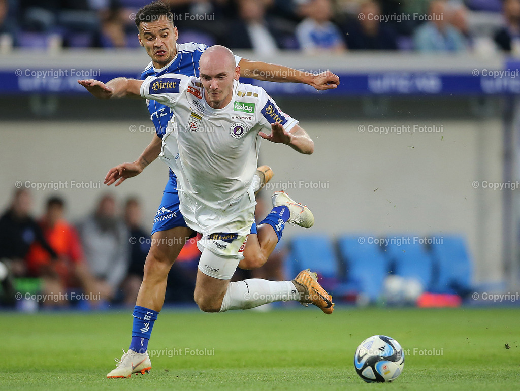A_LUI_300923_07 | SPORT,FUSSBALL,ADMIRAL BUNDESLIGA BLAU WEISS LINZ-AUSTRIA KLAGENFURT 30.09.2023 IM BILD:KRISTIJAN DOBRAS  (BLAUWEISSLINZ) UND NICOLA WIMMER (KLAGENFURT) FOTO:FOTOLUI