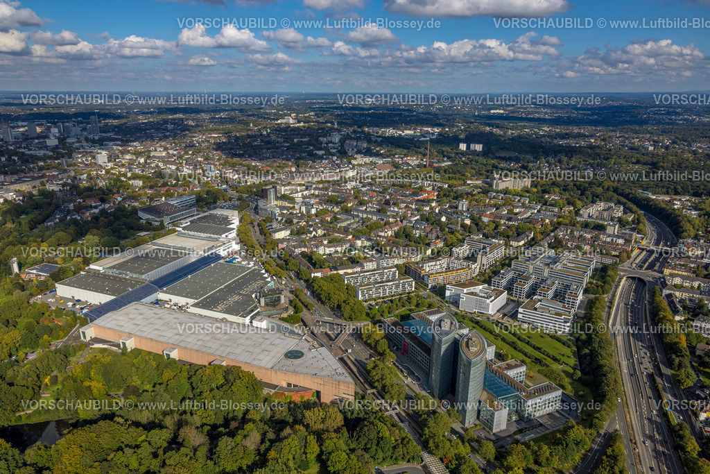Essen241004835 | Luftbild, Messe Essen mit Grugahalle, Gesamtübersicht mit Blick zur City, Gewerbegebiet Messeallee, Fernsicht und blauer Himmel mit Wolken, Rüttenscheid, Essen, Ruhrgebiet, Nordrhein-Westfalen, Deutschland