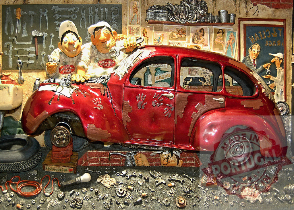 Mechanics repairing vintage car in chaotic garage | Two mechanics working on a vintage car in a messy garage with tools and spare parts scattered around - Realisiert mit Pictrs.com