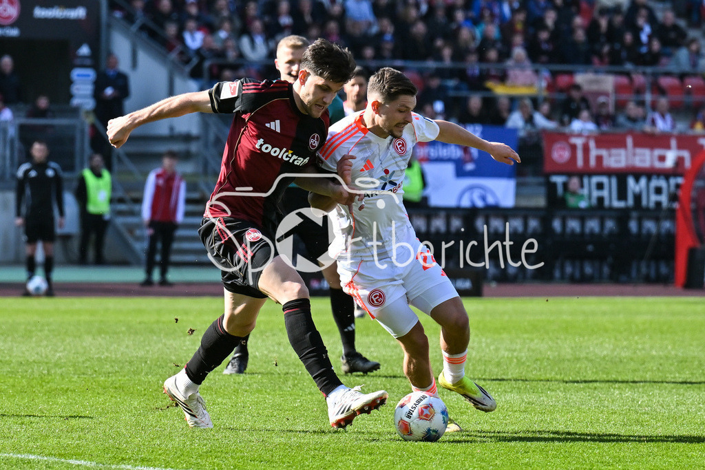 1. FC Nürnberg - Fortuna Düsseldorf | NUREMBERG, GERMANY - 07. MARCH:  im Duell  Ondrej KARAFIAT (1. FC Nuernberg 44) und Florent MUSLIJA (Fortuan Düsseldorf 24) während dem Match zwischen dem 1. FC Nürnberg und Fortuna Düsseldorf am 25. Spieltag der 2. Bundesliga im Max Morlock Stadion / DFL REGULATIONS PROHIBIT ANY USE OF PHOTOGRAPHS AS IMAGE SEQUENCES AND/OR QUASI-VIDEO