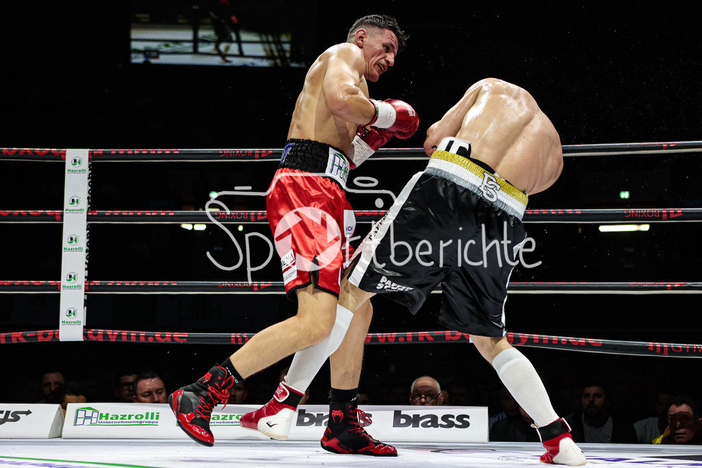Profi - Box - Gala / Main Event | Robin KRASNIQI (rote Hose) in seinem Kampf gegen Rimour NIKARKHOEV (Schwarze Hose)