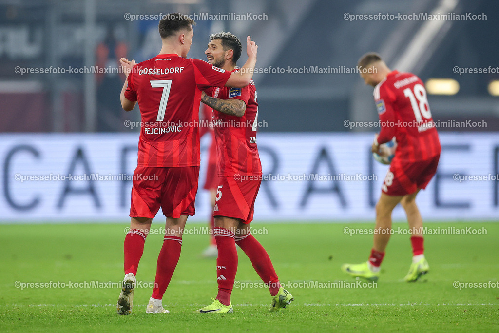 Due09112401066 | 09.11.2024, Fußball, Fortuna Düsseldorf - SC Paderborn 07, 2. Bundesliga, Merkur Spiel-Arena, Saison 2024 2025: Torjubel nach dem 1:0 für Düsseldorf nach EIgentor von Felix Götze (Paderborn #20). Dzenan Pejcinovic (Fortuna Düsseldorf #7) und Matthias Zimmermann (Fortuna Düsseldorf #25) jubelndDFB regulations prohibit any use of photographs as image sequences and or quasi-video.