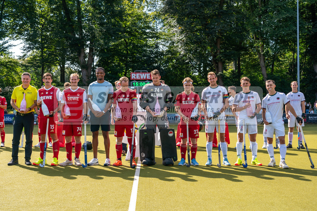 HK_20240907_904624 | 1. Bundesliga Herren RW Köln - Crefelder HTC am 7.9.2024 RW Köln, Köln , Niklas Wellen ( Crefelder HTC 10 ) , Howard Tim ( Crefelder HTC #5 ) , Sharp Lachlan ( Crefelder HTC #9 ) ,  Aran Zalewski ( Rot-Weiss Köln #2 ) , Christopher Rühr ( Rot-Weiss Köln #17 ) Ben Göntgen ( SR ) , Jean Danneberg ( Torwart Rot-Weiss Köln #74 )