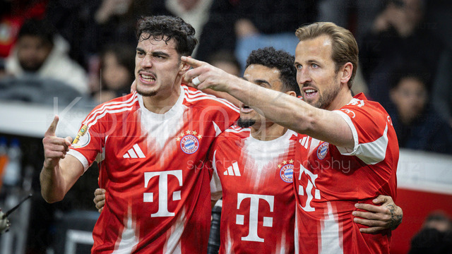 DFB Cup semifinal match Bayer 04 Leverkusen vs. FC Bayern Munich, 22.04.2026 | LEVERKUSEN, GERMANY - APRIL 22, 2026: Harry Kane (FC Bayern Muenchen, 8) celebrates scoring his team's first goal with teammates  during the German DFB Cup semifinal match between Bayer 04 Leverkusen vs. FC Bayern Munich at BayArena on April 22, 2026 in Leverkusen, Germany. DFL REGULATIONS PROHIBIT ANY USE OF PHOTOGRAPHS AS IMAGE SEQUENCES AND/OR QUASI-VIDEO.