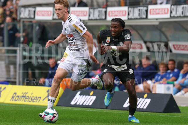 SK Puntigamer Sturm Graz vs TSV Egger Glas Hartberg – Championship Group    | Graz, Austria, 12.Apr.26 - SOCCER - ADMIRAL Bundesliga, SK Puntigamer Sturm Graz vs TSV Egger Glas Hartberg. The image shows Konstantin Schopp (Hartberg) and Seedy Jatta (STU).    