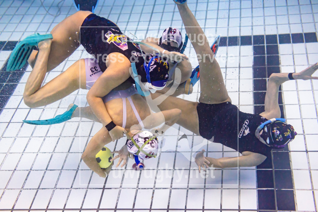 24. - 26.11.2023: Unterwasser-Rugby Champions Cup 2023  | Damen-Spiel: Orcas (Kolumbien) in blau gegen UWRC Wien (Österreich) in weiß. - Realisiert mit Pictrs.com