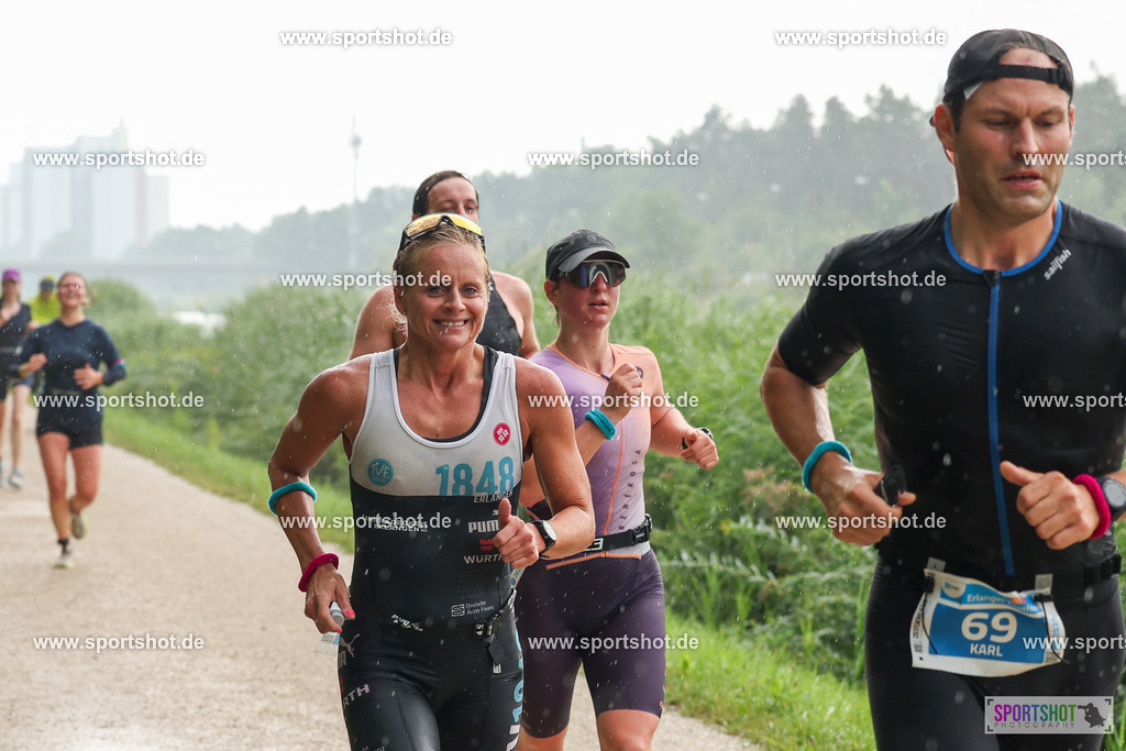 LUR_1348 | 34. M-net Erlanger Triathlon 2025 #erlangertriathlon  #mnettriathlon2025 #mnettriathlon #team #olympischedistanz #mitteldistanz #triathlon #maindonaukanal  #erlangertriathlon2025 #yourpictrs #tv1848 #tv1848erlangen  #triathlonbayern #sportinerlangen #demsportverbunden #sportshot_your_pictrs Copyright: www.sportshot.de