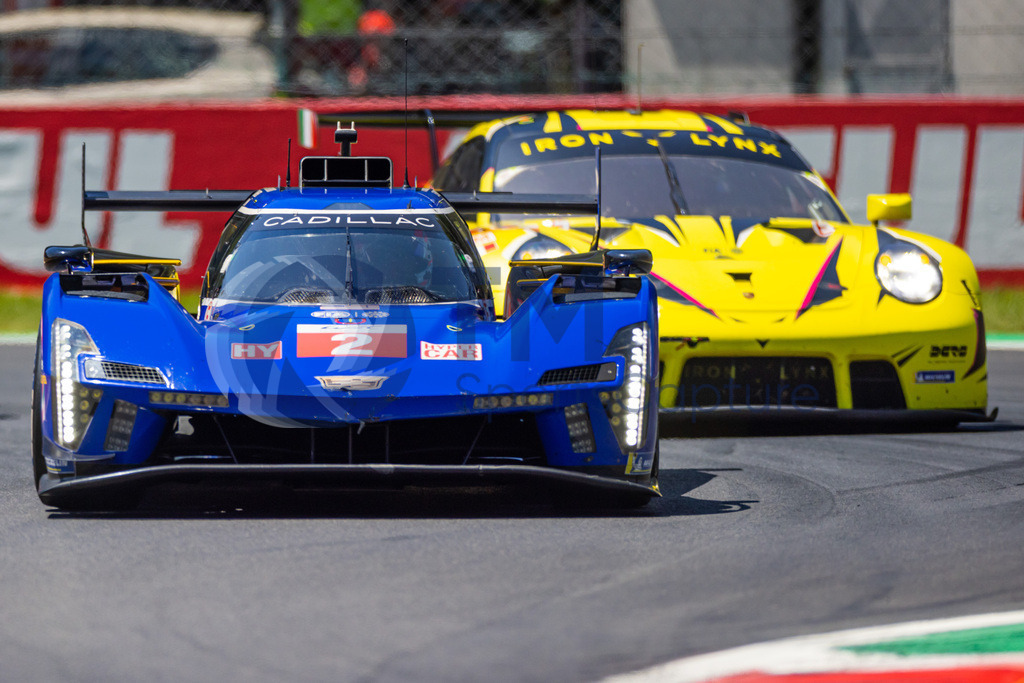 Trainproduction-20230709-0064 | MONZA,ITALY,09.Jul.23 - MOTORSPORTS - WEC, FIA World Endurance Championships, 6h of Monza, Autodromo Monza. Image showsEarl Bamber (NZL), Alex Lynn (GBR) and Richard Westbrook (GBR/ Cadillac Racing) and Claudio Schiavoni (ITA), Matteo Cressoni (ITA) and Alessio Picariello (BEL/ Iron Lynx).   Photo: Trainproduction / Matthias Trinkl