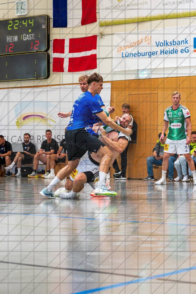 IHC 2026 - TSV Hannover-Burgdorf vs. Mors-Thy Håndbold | Lasse Mathias Pedersen (Mors-Thy Håndbold #2), Tim Zechel (TSV Hannover-Burgdorf #55); IHC 2026 - TSV Hannover-Burgdorf vs. Mors-Thy Håndbold am 07.08.26 in Sporthalle KGS, Schneverdingen - Realisiert mit Pictrs.com