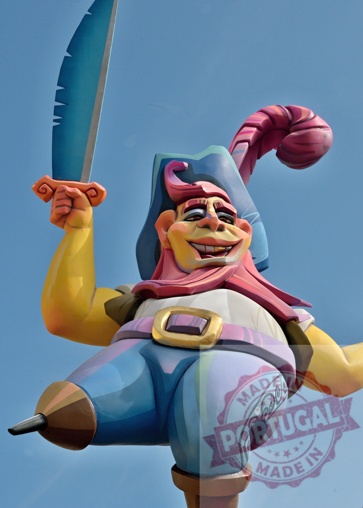 Fallas festival pirate caricature figure against clear sky. Fallas Fiestas Communidad Valenciana | Colorful pirate ninot sculpture from the Las Fallas festival in València - Realized with Pictrs.com