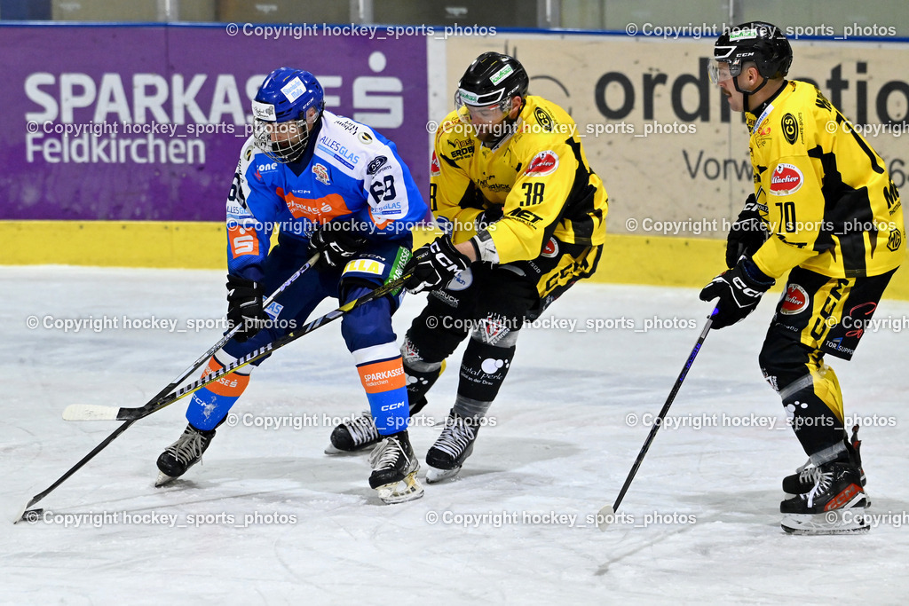 ESC SPARKASSE STEINDORF vs. MET PHOTOVOLTAIK HORNETS SPITTAL | #69 Kreuzer Philipp ESC Steindorf, #38 Zorec Marco EC Hornets Spittal, #70 Kronig Daniel EC Hornets Spittal, ESC SPARKASSE STEINDORF vs. MET PHOTOVOLTAIK HORNETS SPITTAL, ESC SPARKASSE STEINDORF vs. MET PHOTOVOLTAIK HORNETS SPITTAL am 22.11.2025 in Steindorf (Ossiachersee Halle), Austria, (Photo by Bernd Stefan)