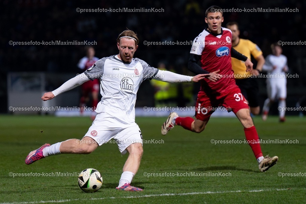 xYDR12032501172 | 12.03.2025, xydrx, Fußball, Viktoria Köln - Rot-Weiss Essen, 3.Liga, Sportpark Höhenberg, Saison 2024 2025: Dominik Martinovic (Rot-Weiss Essen #27) schießt auf das Tor von Viktoria Köln. DFB regulations prohibit any use of photographs as image sequences and or quasi-video.