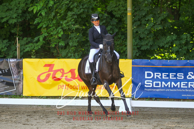 DKP42324 | Turniersportfotografie; Pferdefotografie; Dressurfotografie