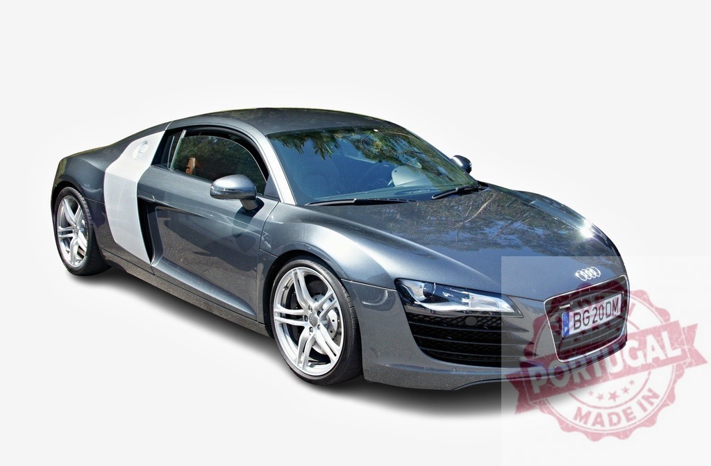Grey Audi R8 sports car parked, reflecting trees in the hood | Modern luxury sports car Audi R8 parked in the sunlight reflecting trees in the hood - Realized with Pictrs.com