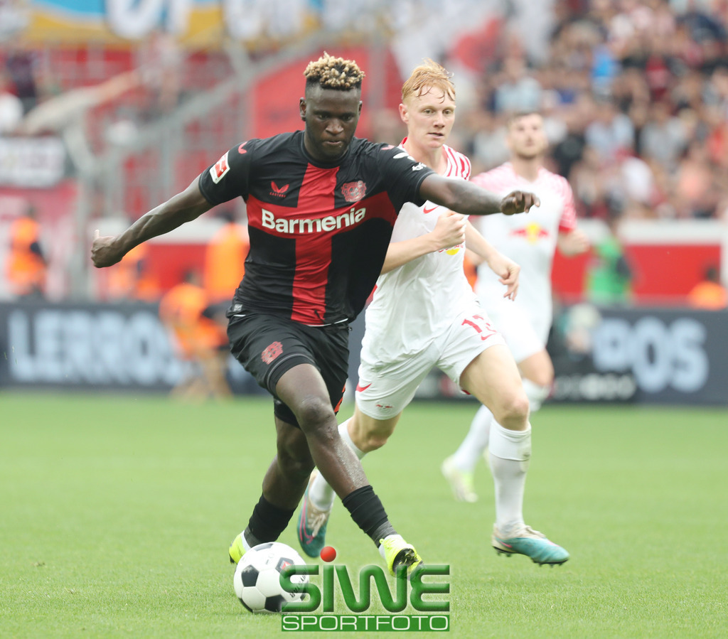 1.Fussball-Bundesliga  :    Bayer 04 Leverkusen--RB Leipzig   1.Spltg. | 19.08.2023; Fussball; GER;  Saison 2023/2024 ; 1.Bundesliga;  1.Spieltag. : 
 Bayer 04 Leverkusen -- RB Leipzig  :    Victor Boniface (22/B04)
in Aktion.
DFL REGULATIONS PROHIBIT ANY USE OF PHOTOGRAPHS AS IMAGE SEQENCES AND/OR QUASI-VIDEO. - Realisiert mit Pictrs.com