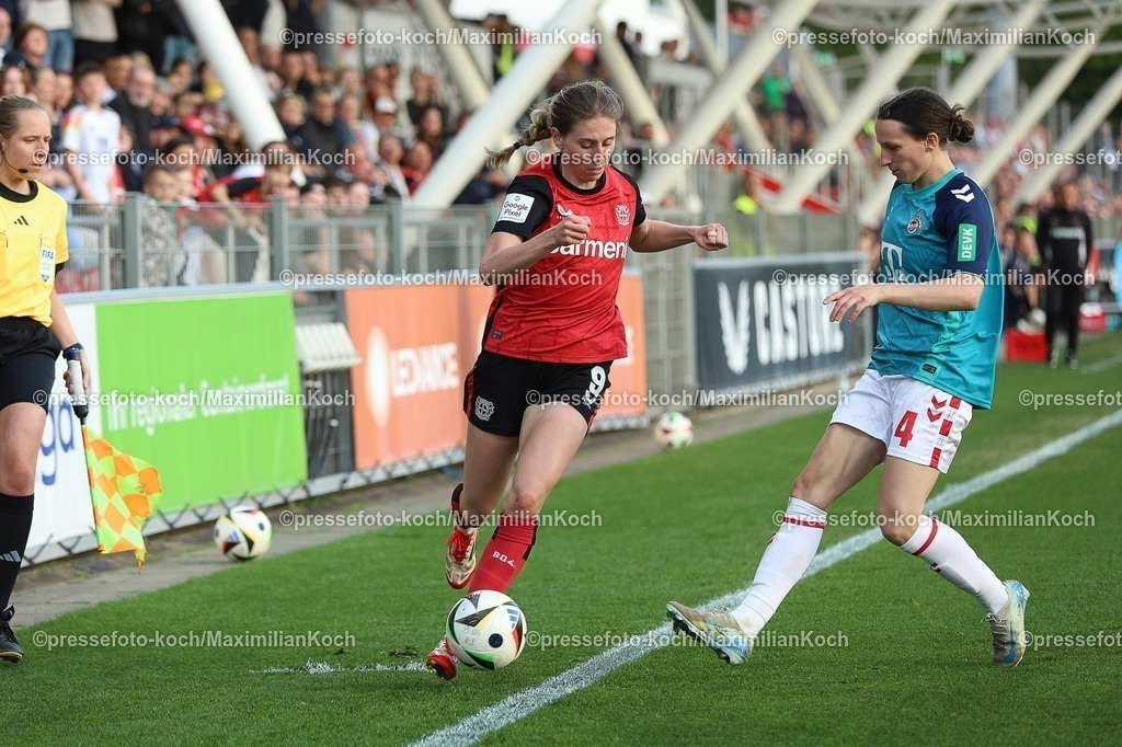xssc14042501021 | 14.04.2025, xsscx, Frauen Fußball, Bayer 04 Leverkusen - 1. FC Köln, 1. Fußball Bundesliga, Ulrich-Haberland-Stadion, Saison 2024 2025: Caroline Kehrer (Bayer 04 Leverkusen 9) im Zweikampf gegen Sara Agrez (1. FC Köln 4) DFB regulations prohibit any use of photographs as image sequences and or quasi-video.