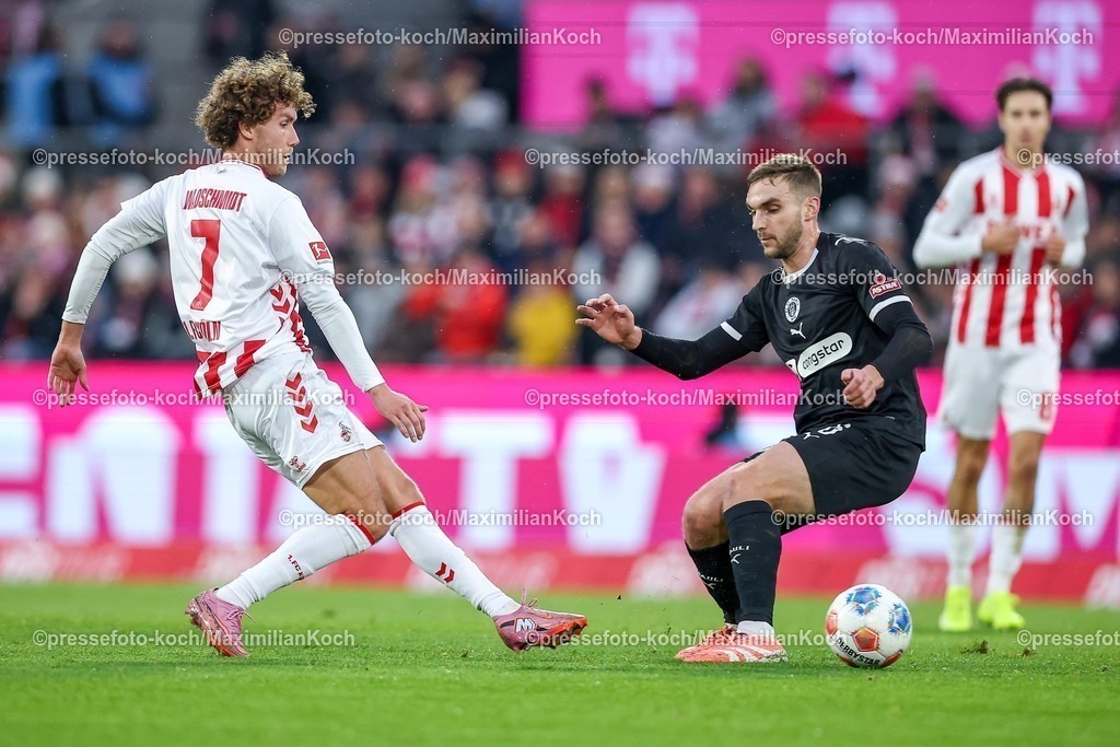 1FC06122501036 | 06.12.2025, Fußball, 1. FC Köln - FC St. Pauli, 1. Fußball Bundesliga, 13. Spieltag, RheinEnergie-STADION, Saison 2025 2026: Luca Waldschmidt&nbsp;(1FC Koeln #07)  im Zweikampf gegen  James Sands&nbsp;(FC St.Pauli #06) DFB regulations prohibit any use of photographs as image sequences and or quasi-video.