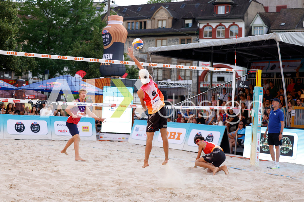 Obi BeachTour 2026 - Basel | BASEL, SWITZERLAND - JULY 18: TINKO SCHNEGG (SUI) attack / spike during the Obi BeachTour 2026 match between MASSEREY / SCHNEGG (SUI) and BREER / KÄLIN (SUI) at Barfüsserplatz on July 18, 2026 in Basel, Switzerland. - Realisiert mit Pictrs.com