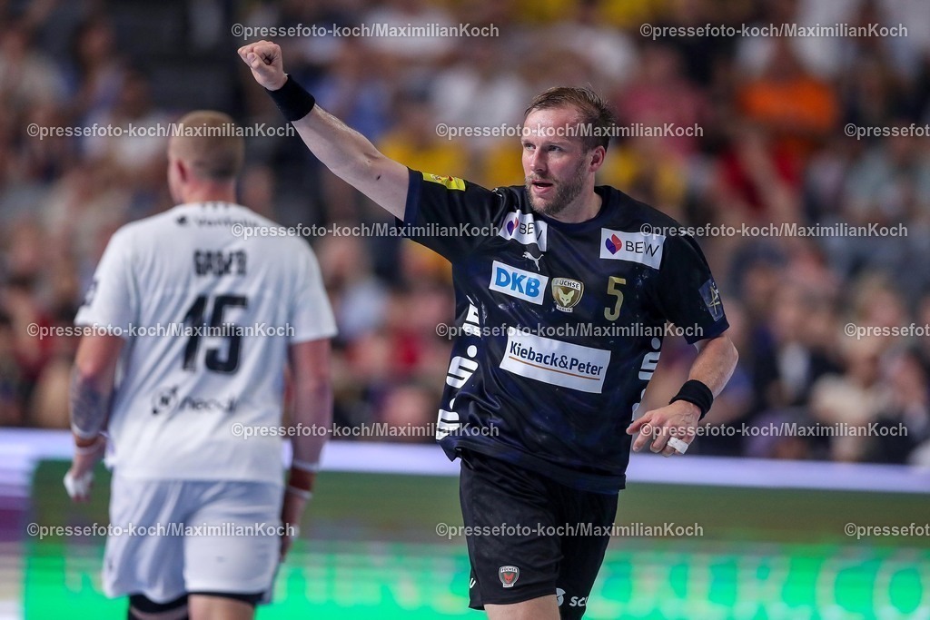 KoeEHF14062501031 | 14.06.2025, Handball, Halbfinale TruckScout24 EHF FINAL4, LANXESS arena Köln, Füchse Berlin - HBC Nantes: Max Darj  (Fuechse Berlin #05) jubelnd 