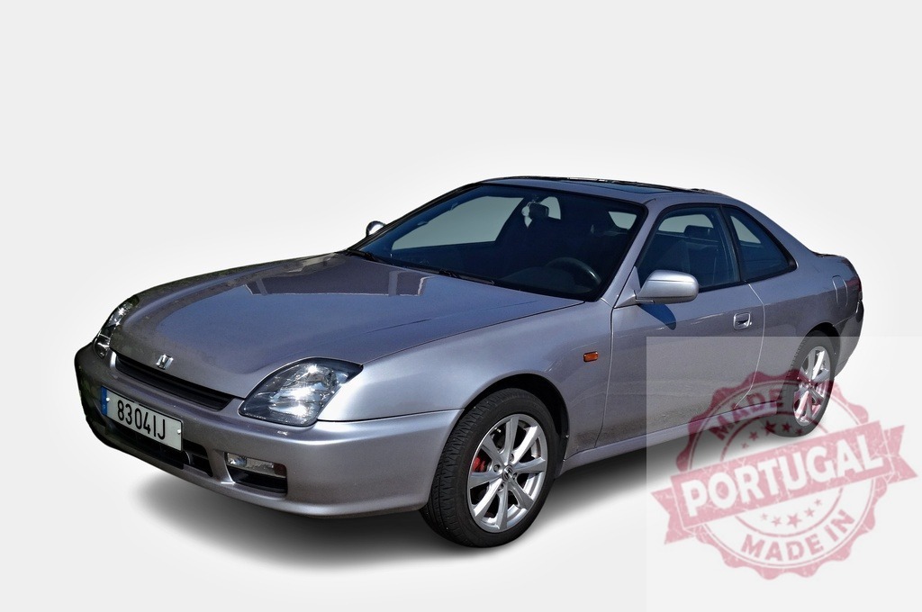 Silver Honda Prelude Coupe Parked on White Background | Gleaming silver Honda Prelude coupe exudes sporty elegance on a minimalist white backdrop, capturing its timeless design - Realisiert mit Pictrs.com