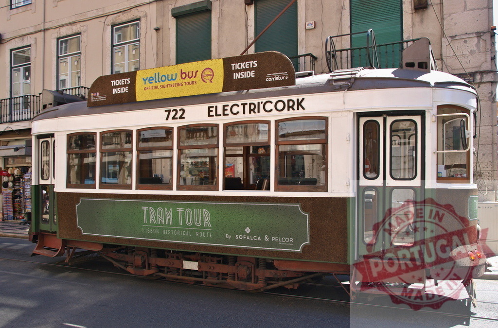 Vintage Lisbon Tram 722 parked on a sunny day | Green and white vintage tram number 722 parked on Lisbon's historical route on a sunny day - Realized with Pictrs.com