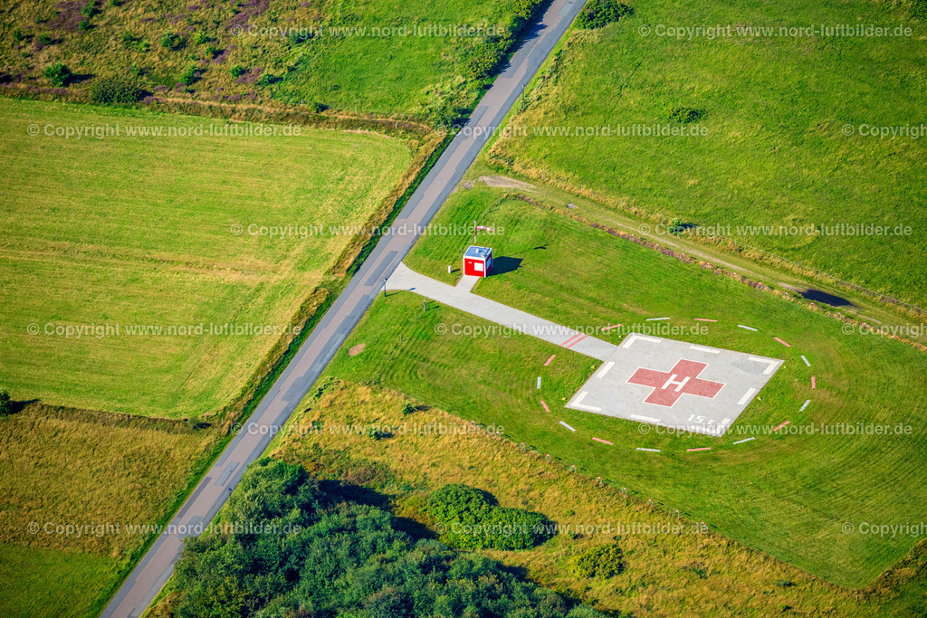 Amrum_Helikopter_Landeplatz_ELS_3545280824 | NEBEL 28.08.2024 Helikopter Landeplatz - Flugplatz für Hubschrauber an der Straße Sateldünwai in Nebel Amrum im Bundesland Schleswig-Holstein, Deutschland. // Helipad - airfield for helicopters on street Satelduenwai in Nebel Amrum in the state Schleswig-Holstein, Germany. Foto: Martin Elsen