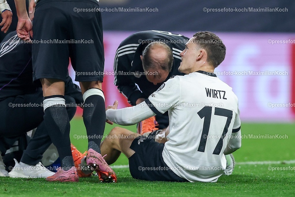 DFB10102501101 | 10.10.2025, Fußball, Länderspiel, Deutschland - Luxemburg, UEFA WM-Qualifikation, 2025/2026, Gruppe A, PreZero Arena in Sinsheim: Florian Wirtz (GER #17) liegt mit Schmerzen auf dem Spielfeld und muss medizinisch versorgt werden DFB regulations prohibit any use of photographs as image sequences and or quasi-video.