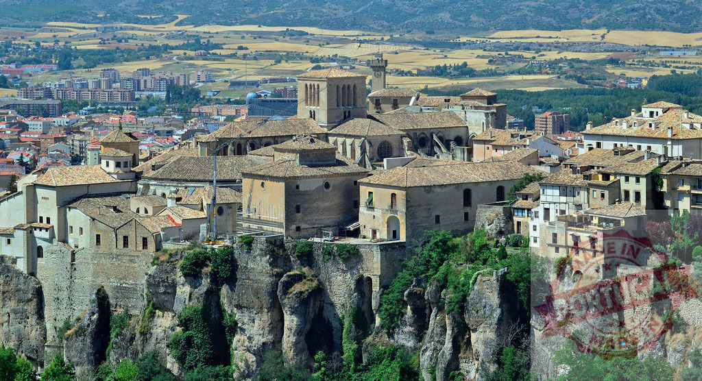 Cuenca Spain old town and Hanging Houses on cliff. Cuenca - Spain | Traditional Casas Colgadas built on high cliff overlooking landscape in Cuenca, Spain - Realized with Pictrs.com