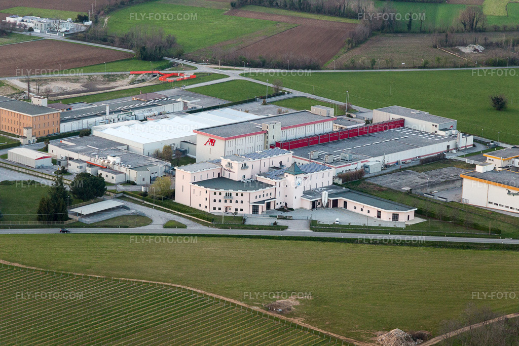 Aerial view: Warehouses for the maturation of ham in the industrial area of Prosciuttificio Friulano and Leoncini Prosciutti in San Daniele del Friuli in the state Udine, Italy.Photo: IMG_105636.jpg taken on 04/07/2018 by Werner Riehm/FLY-FOTO.comResolution of the original: 5472 x 3648 px