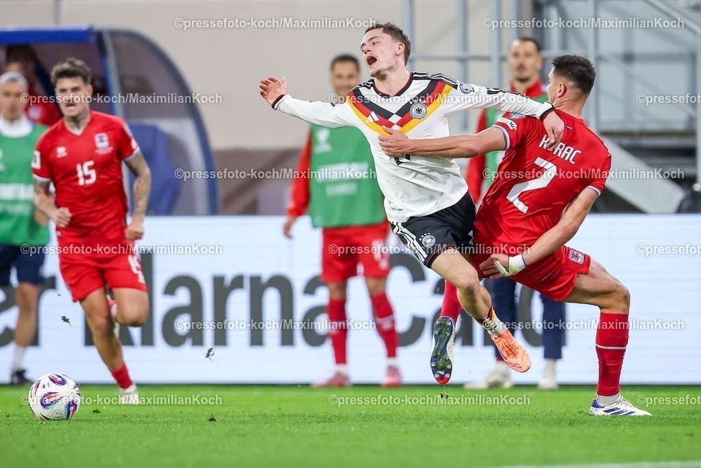 DFB14112501090 | 14.11.2025, Fußball, Länderspiel, WM-Qualifikation Europa, Deutschland - Luxemburg, Stade de Luxembourg (Croix de Gasperich, Luxemburg), 9. Spieltag, Saison 2025 2026: Foulspiel Seid Korac (LUX #02) an Florian Wirtz (GER #17)  Regulations prohibit any use of photographs as image sequences and or quasi-video.