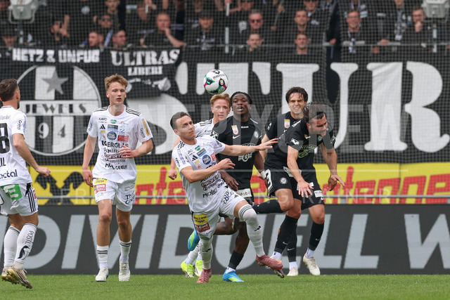 SK Puntigamer Sturm Graz vs TSV Egger Glas Hartberg – Championship Group    | Graz, Austria, 12.Apr.26 - SOCCER - ADMIRAL Bundesliga, SK Puntigamer Sturm Graz vs TSV Egger Glas Hartberg. The image shows Lukas Fridrikas (Hartberg) and Gizo Mamageishvili (STU) in game action.    