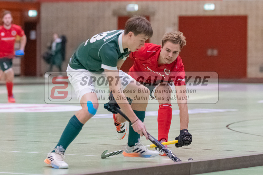 HK_20230108_102436 | 1. Bundesliga ( Halle ) Herren Crefelder HTC - Uhlenhorst Mülheim am 8.1.2023 Crefelder HTC  ( CHTC ), Krefeld , Maximilian Stahlmann ( Uhlenhorst Mülheim #33 ) , van Ehren Christian ( Crefelder HTC #16 )