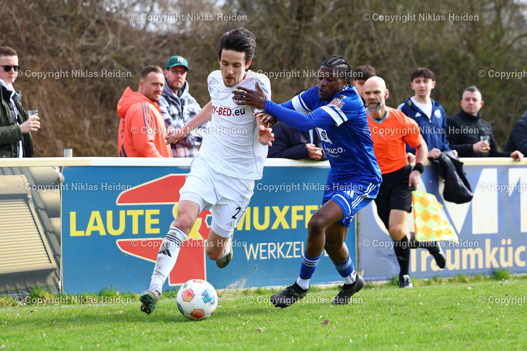 NH_TuSDassendorf_NiendorferTSV_OberligaHamburg_21032026 | #2 Eyke Kleine (TuS Dassendorf), #23 Joseph Noha Akugue (Niendorfer TSV)Fußball I Herren I Gamesright Oberliga Hamburg I Saison 2025-2026  I 28. Spieltag I TuS Dassendorf - Niendorfer TSV I 21.03.2026 I Sportplatz Wendelweg