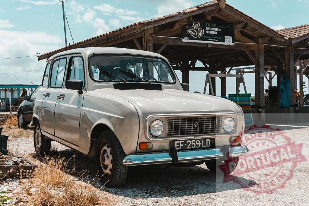 Renault 4 classic car parked near oyster farm | Renault 4 vintage automobile parked at a coastal oyster farm on a sunny day - Realized with Pictrs.com