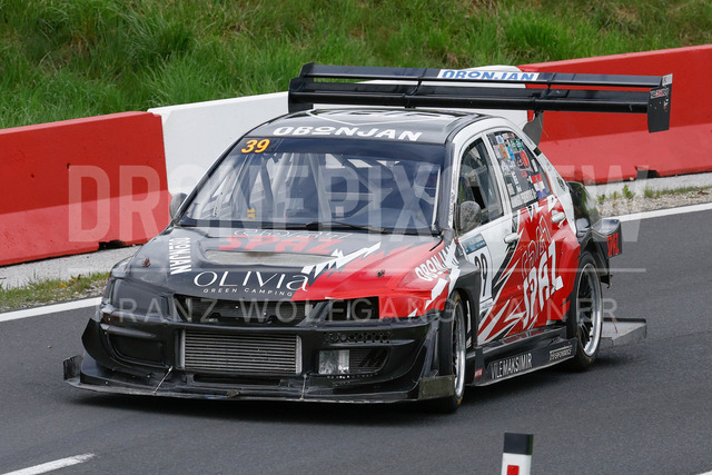 Rechberg Hill Climb 2025 – FIA European Hill Climb Championship | Rechberg Hill Climb 2025, part of the FIA European Hill Climb Championship. High-speed racing action, mountain scenery, atmosphere and pure motorsport passion captured in detail. The image shows Domagoj Perekovic (CRO) Mitsubishi Lancer Evo 9.          