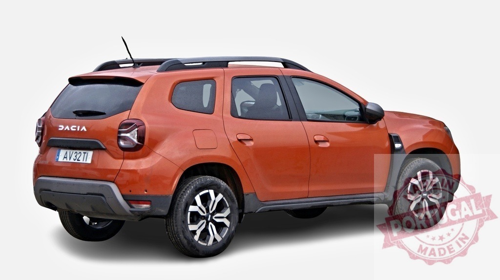 Dacia Duster showing its rear side, parked on a white background | Orange Dacia Duster with roof rack, showcasing its back design, isolated on white - Realized with Pictrs.com