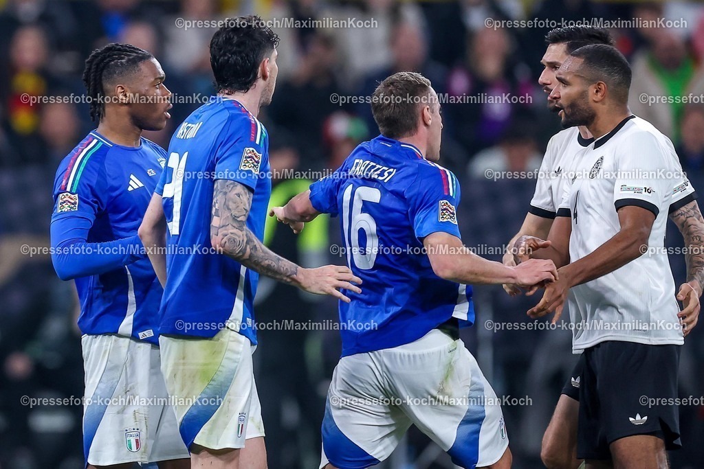 DFB23032501095 | 23.03.2025, Fußball, Viertelfinale UEFA Nations League, Deutschland - Italien, Signal Iduna Park, Saison 2024 2025: Handgemenge auf dem Platz zwischen Iyenoma Destiny Udogie (ITA #19)  und Jonathan Tah (GER #04) DFB regulations prohibit any use of photographs as image sequences and or quasi-video.