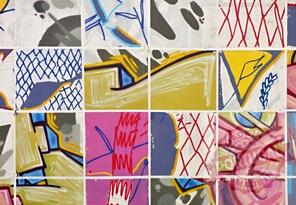 Colorful street art graffiti abstract pattern collage creating urban mosaic | Colorful abstract graffiti art creating a vibrant urban pattern on a tiled wall - Realisiert mit Pictrs.com