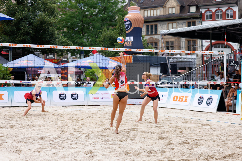Obi BeachTour 2026 - Basel | BASEL, SWITZERLAND - JULY 17: ZOÉ FLÜCKIGER (SUI) attack / spike during the Obi BeachTour 2026 match between FLÜCKIGER / DEMIERRE (SUI) and EUGSTER / GÄHWILER (SUI) at Barfüsserplatz on July 17, 2026 in Basel, Switzerland. - Realisiert mit Pictrs.com